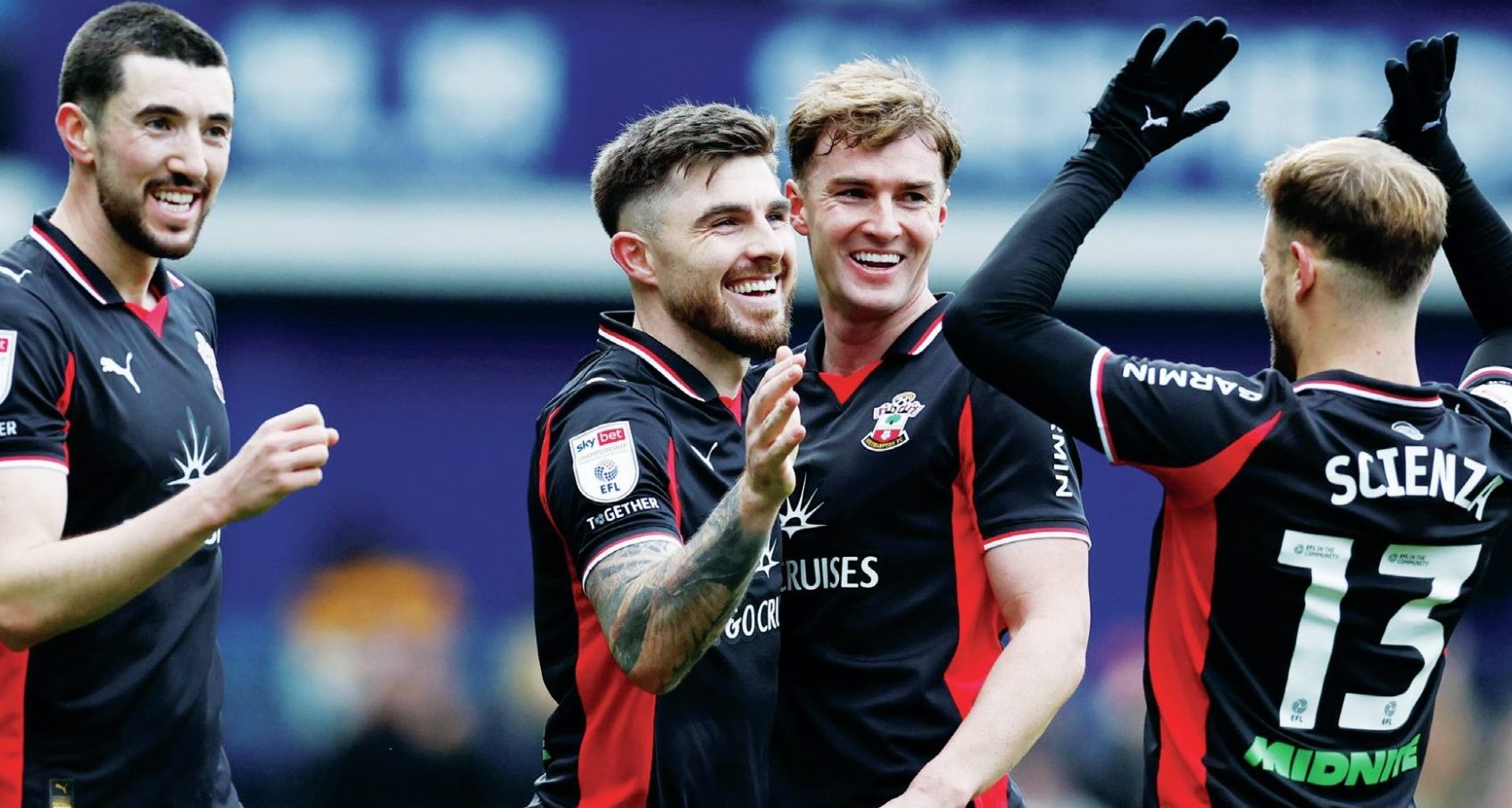 Southampton’s Ryan Manning, second left, celebrates scoring their second with his teammates