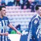 Jensen Weir celebrates scoring his crucial winner with his Wigan Athletic team-mates