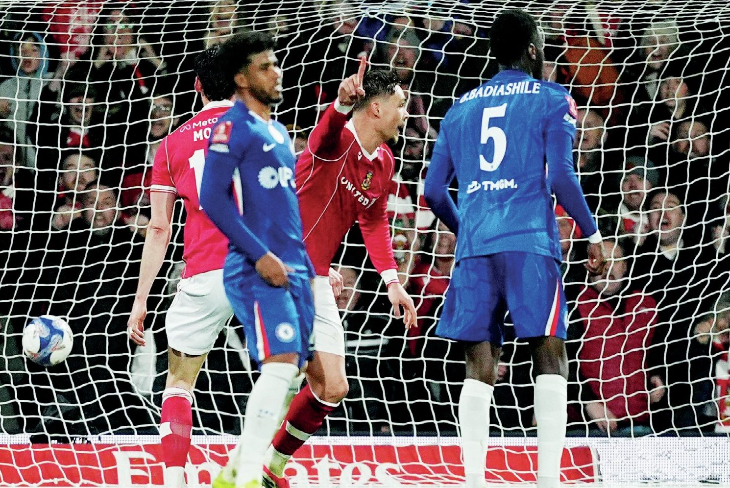 Callum Doyle, centre, celebrates putting Wrexham 2-1 up