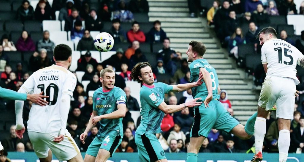 MK Dons&rsquo; Luke Offord, right, makes it 2-1