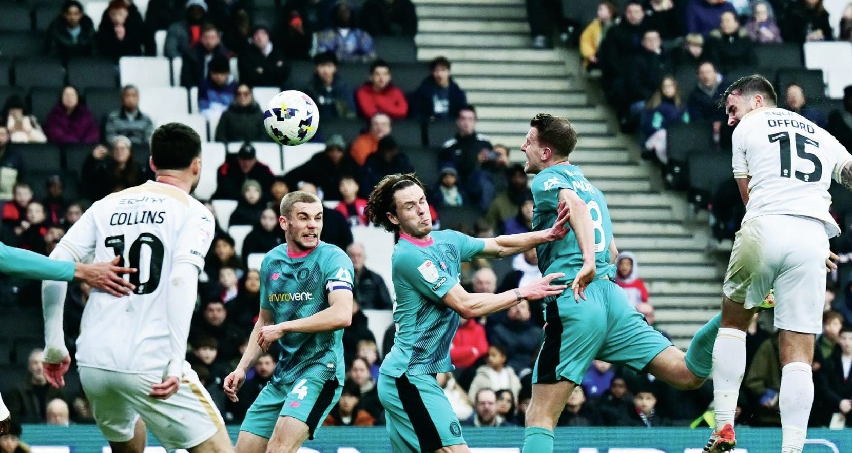 MK Dons’ Luke Offord, right, makes it 2-1