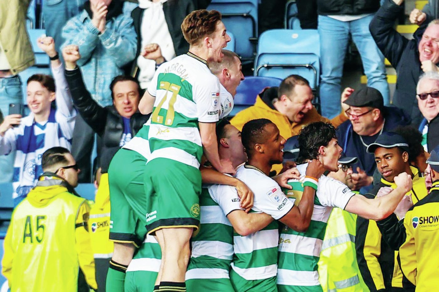 QPR’s Ronnie Edwards savours scoring their third goal with his teammates and fans