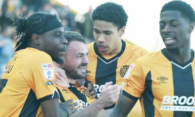 Cambridge United’s James Gibbons, second left, takes the acclaim for his winner