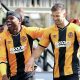 Cambridge United skipper Dominic Ball celebrates making it 1-0 with Pelly Mpanzu