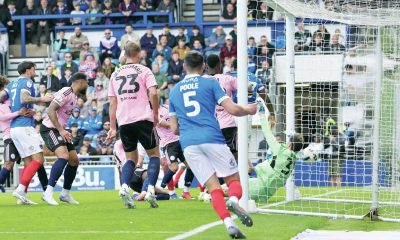 Ibane Bowat, partially hidden, scores Portsmouth’s winner past Asmir Begovic