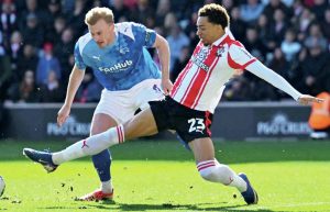 Southampton’s Sam Edozie, right, challenges for the ball in last week’s 2-1 win against Derby County