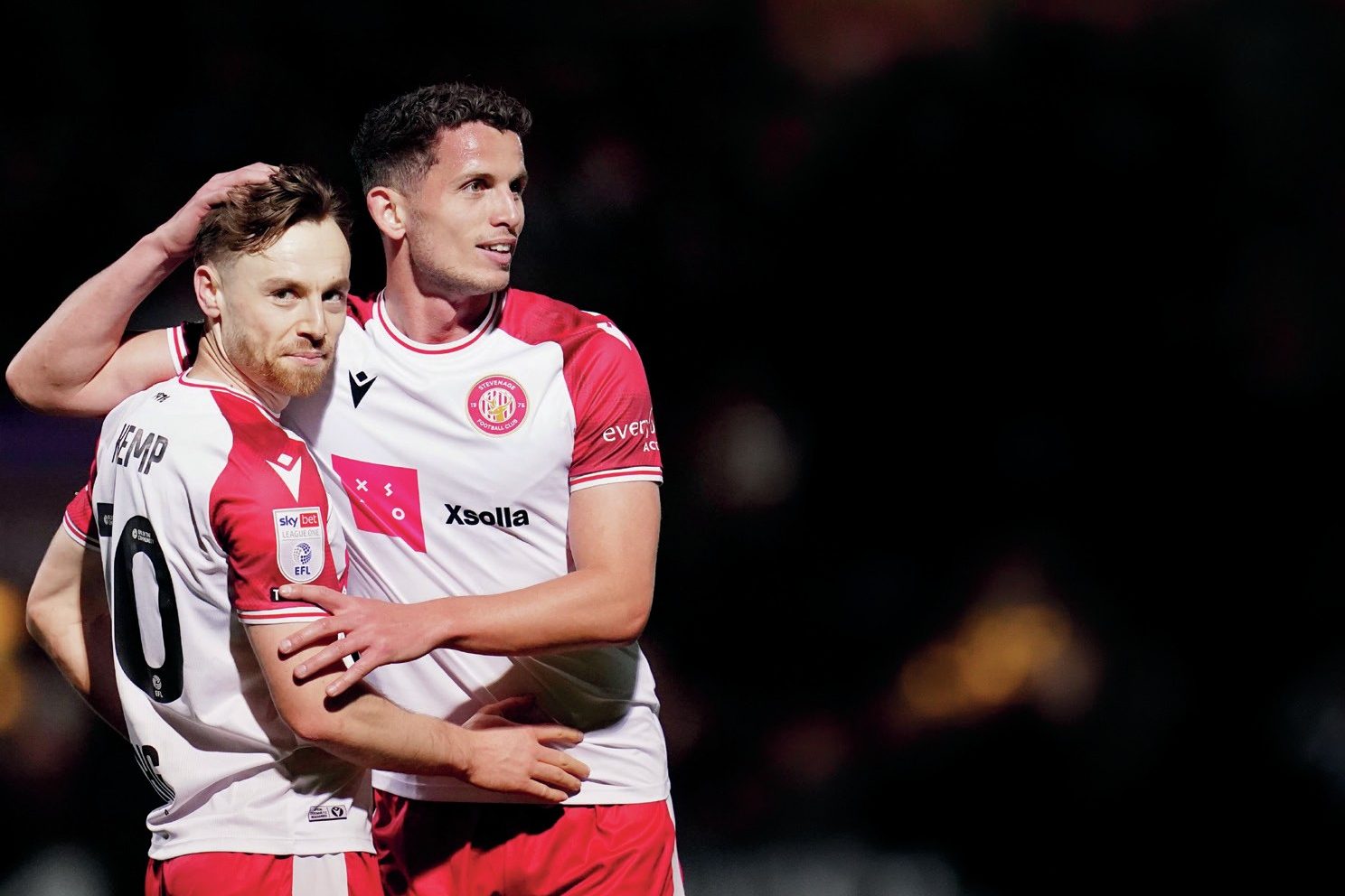 Goalscorer Dan Kemp, left, and Jordan Houghton celebrate beating Barnsley in midweek